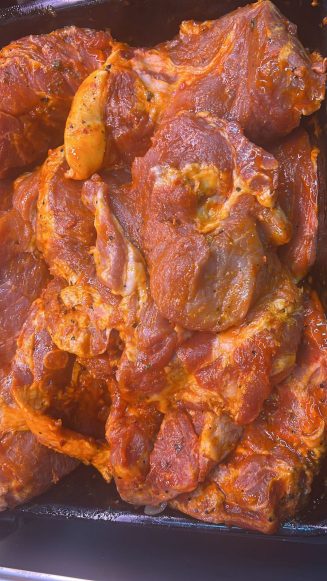 Marinated pork neck steaks