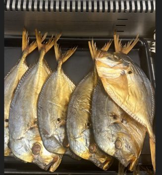 Gerookt varkensvlees 13,99 kg.